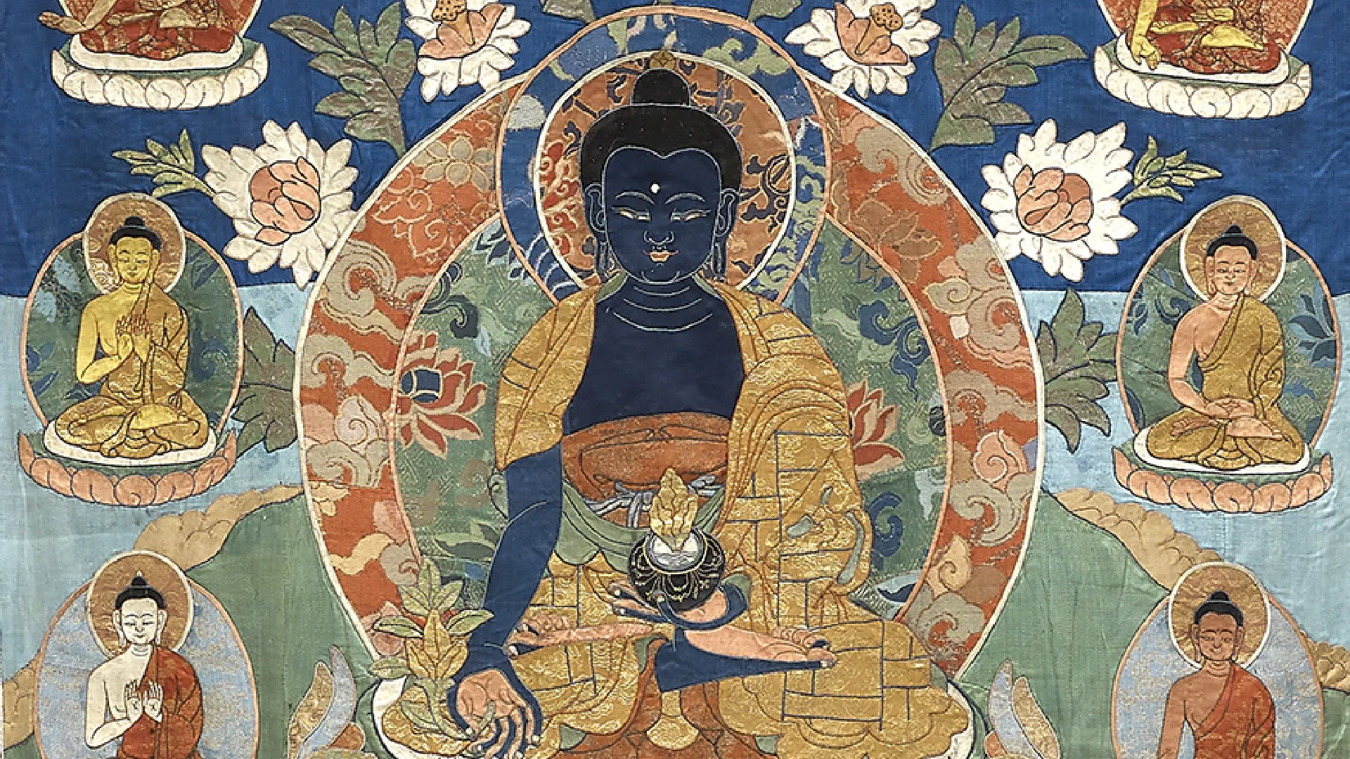 A silk appliqué thangka of Bhaishajyaguru