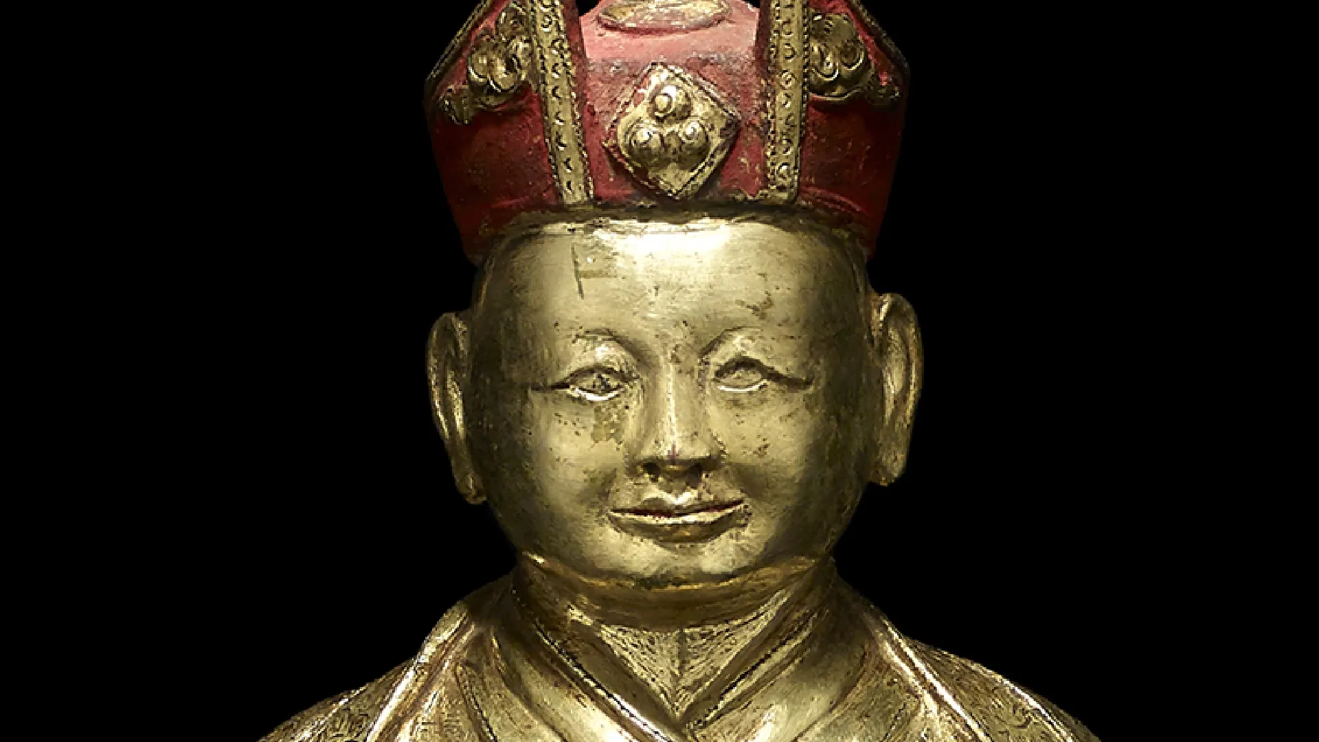 A gilt copper alloy figure of the Fourth Sharmapa, Chokyi Drakpa Yeshe Pal Zangpo