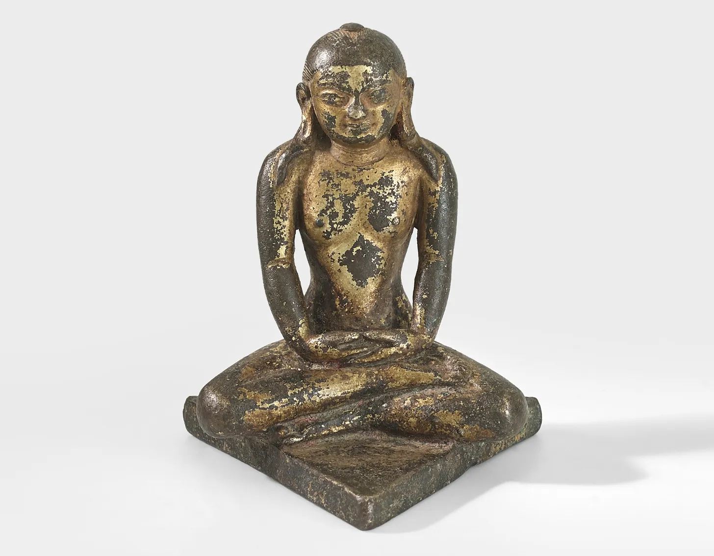 Close up look of : A gilt copper alloy figure of Jina Rishabha