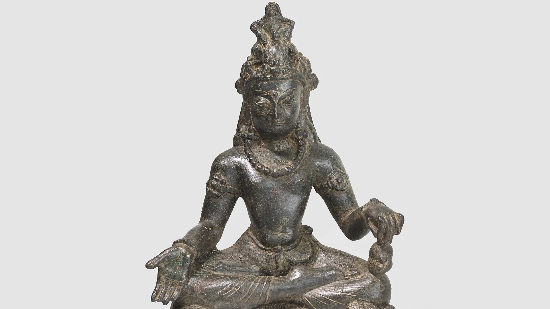 A copper alloy figure of Maitreya