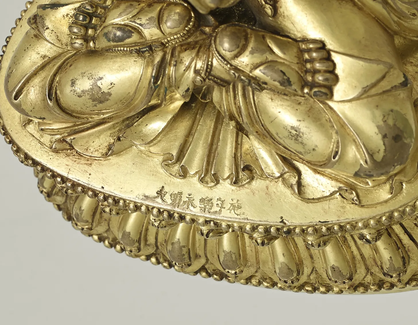 Close up look of : A gilt copper alloy figure of Manjushri