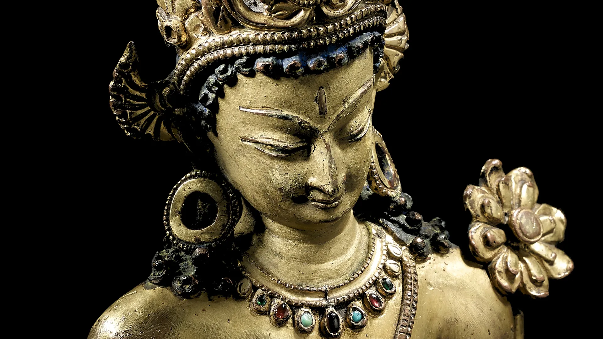 A gilt copper alloy figure of Padmapani