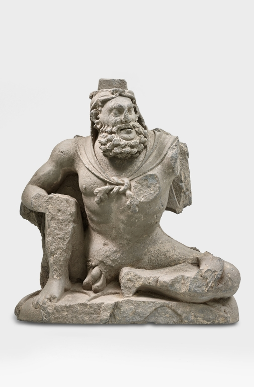 A grey schist figure of Atlas