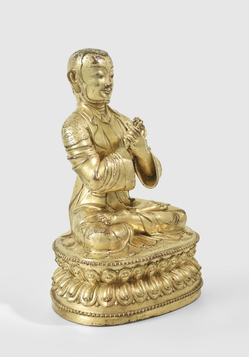 A gilt copper alloy figure of Drakpa Gyaltsen