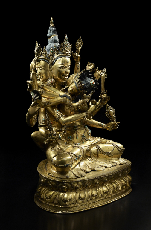 A gilt copper alloy figure of Guhyasamaja