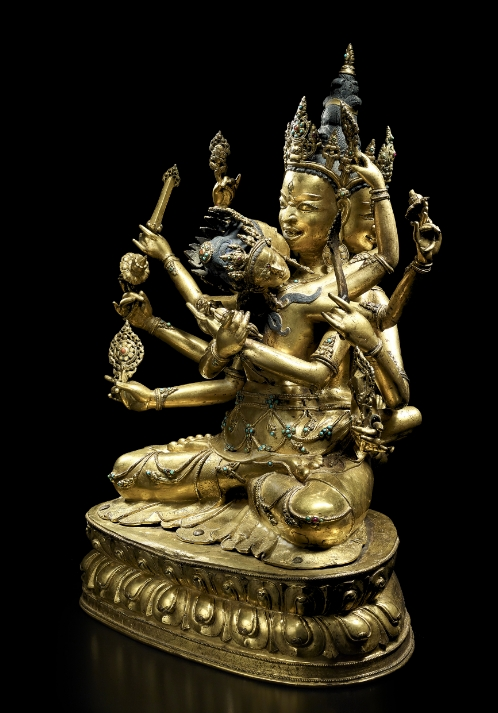 A gilt copper alloy figure of Guhyasamaja