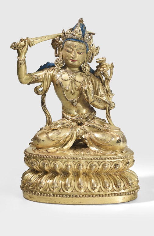 A gilt copper alloy figure of Manjushri