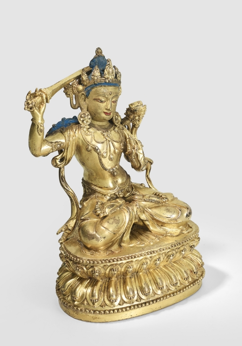 A gilt copper alloy figure of Manjushri
